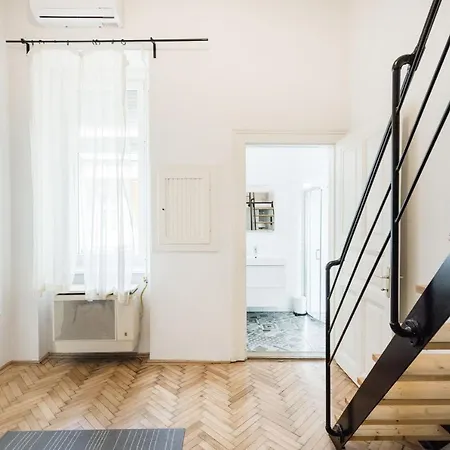 Live Like A Local At The Rustic Hockey Hut Apartman Budapest